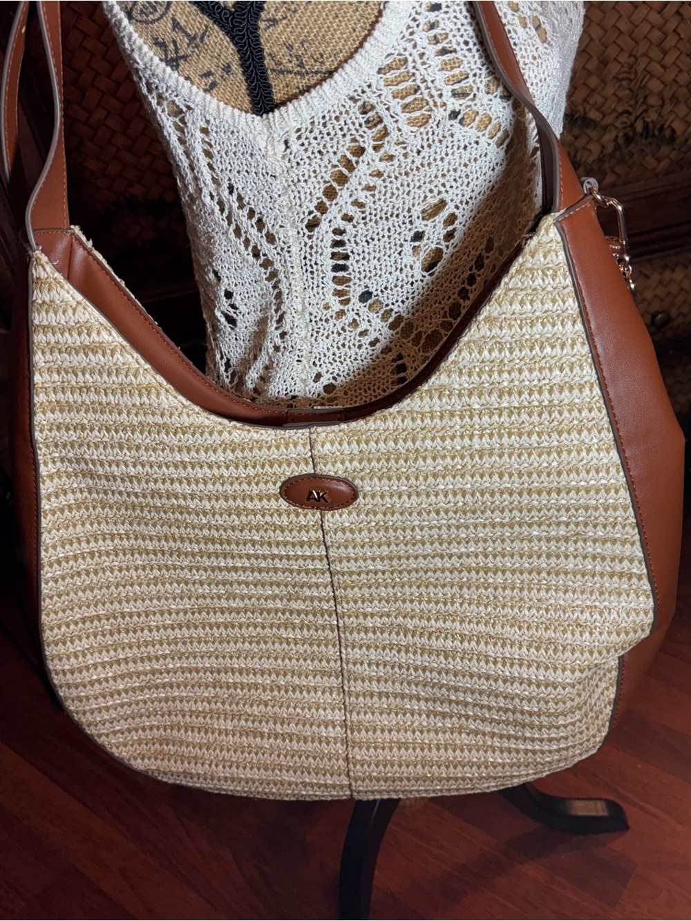 Anne Klein Cream Straw Shoulder Bag with Brown Trim with bag charm